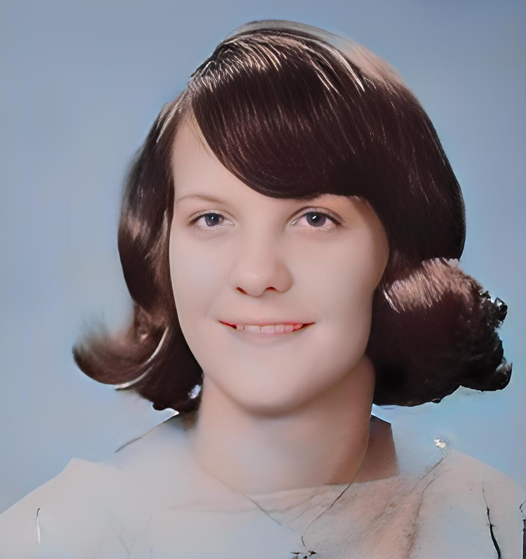 Joan  Hughes